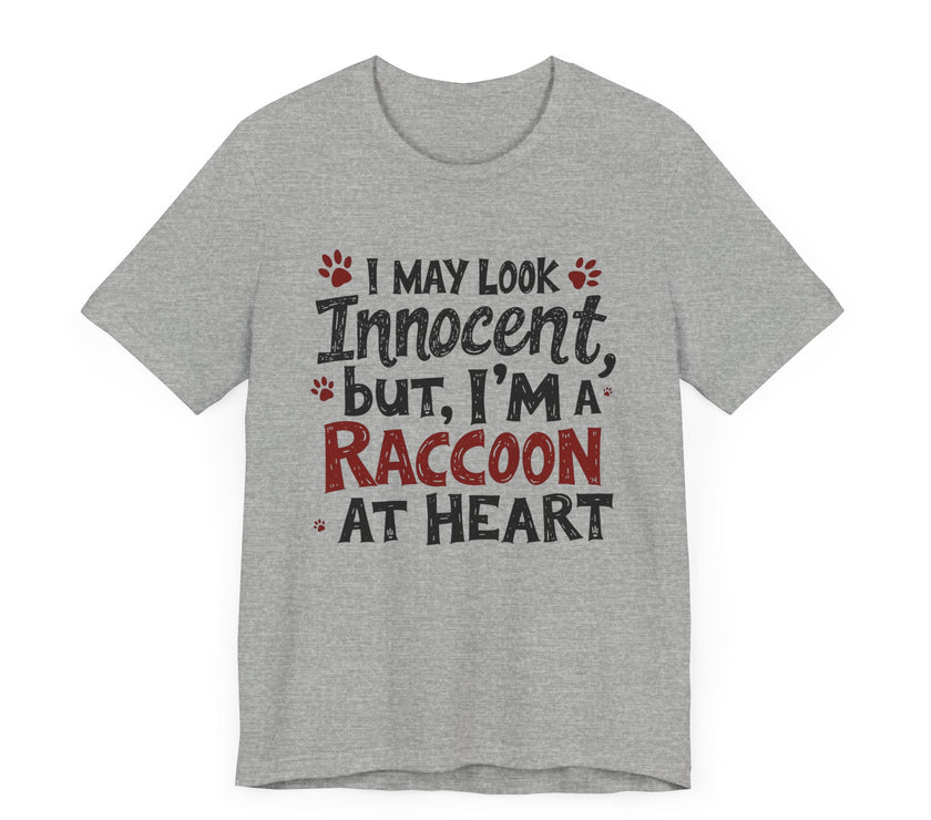 I May Look Innocent, But I'm a Raccoon at Heart - Funny Raccoon T-Shirt