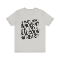 I May Look Innocent, But I'm Raccoon at Heart - Funny Raccoon T-Shirt