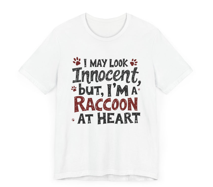 I May Look Innocent, But I'm a Raccoon at Heart - Funny Raccoon T-Shirt