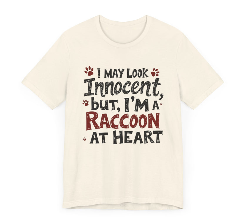 I May Look Innocent, But I'm a Raccoon at Heart - Funny Raccoon T-Shirt